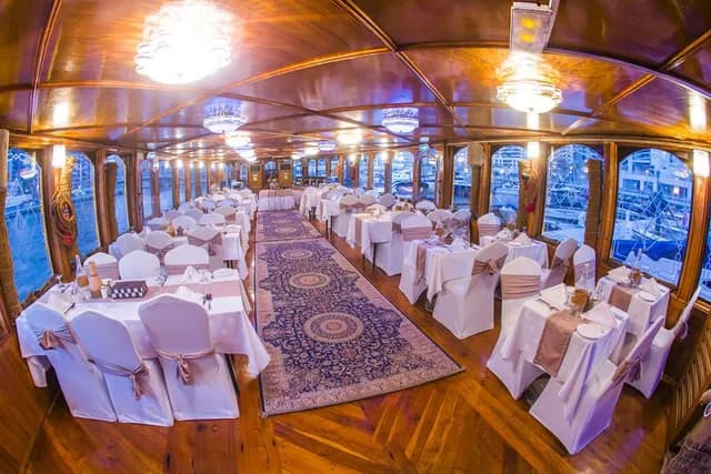 Dining tables set on the wooden lower deck