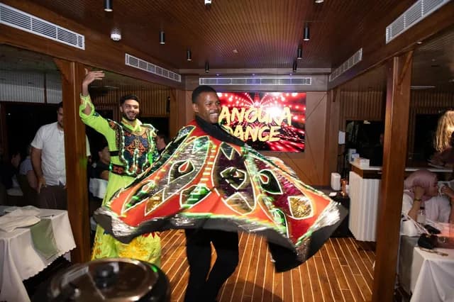 Tanoura dancer performing on board