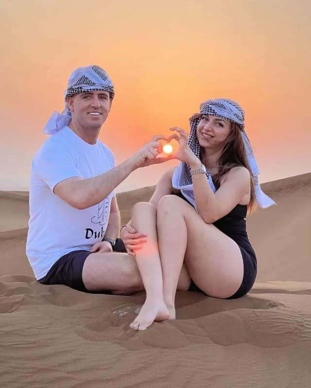 Friends taking photos on the dunes
