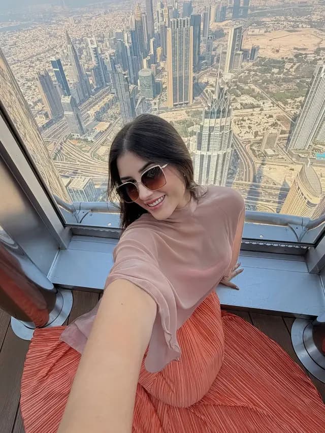 Guest taking a selfie high above Downtown Dubai