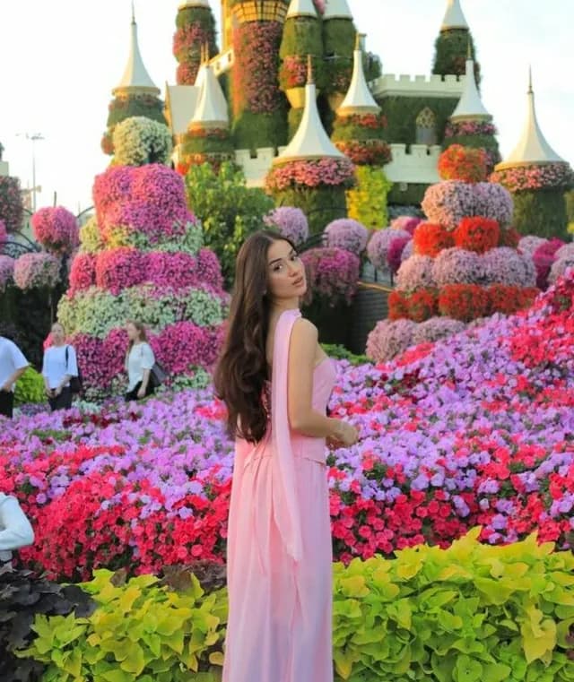 Guest beside the layered flower beds