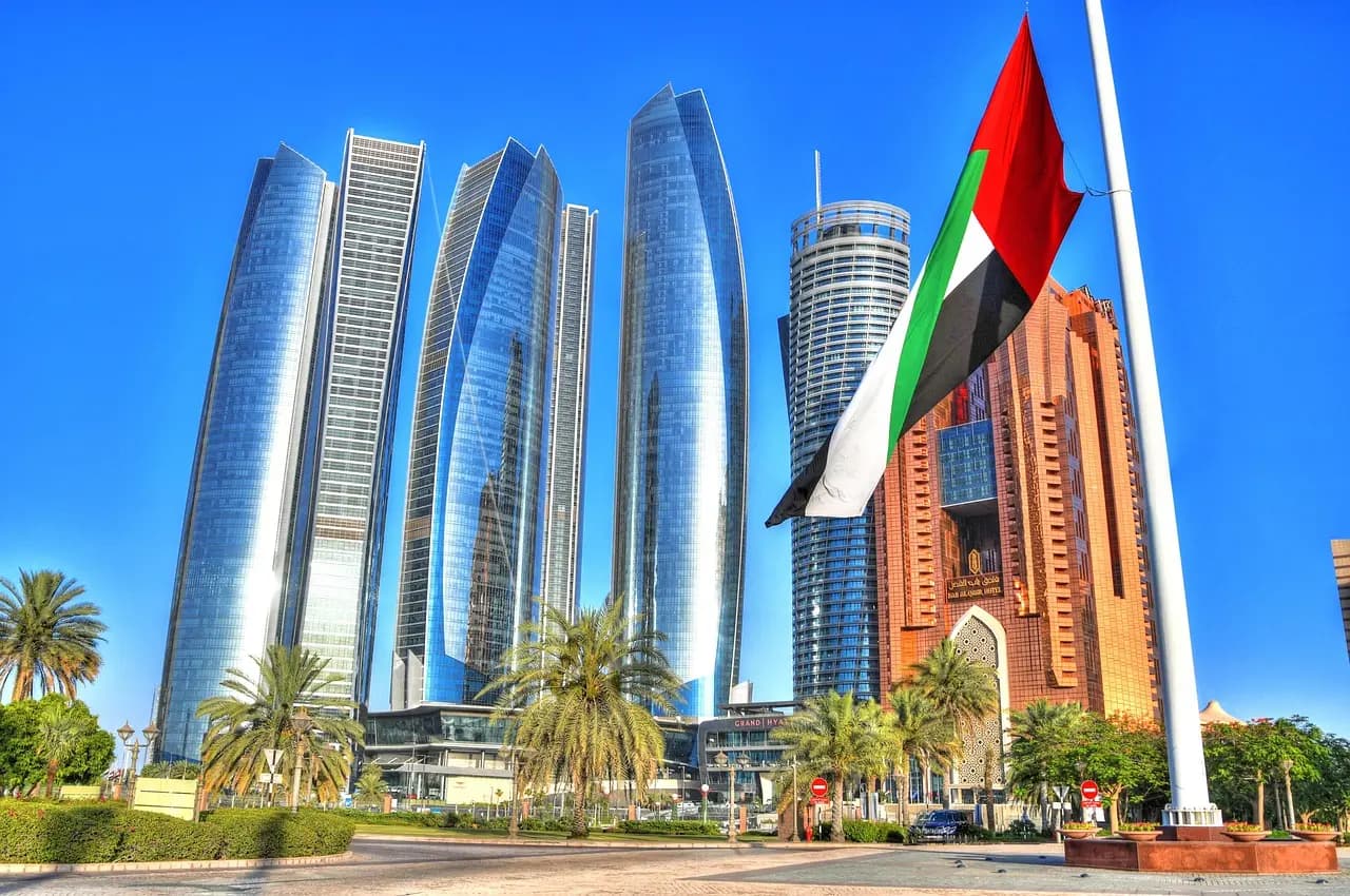 Etihad Towers with the UAE flag in Abu Dhabi